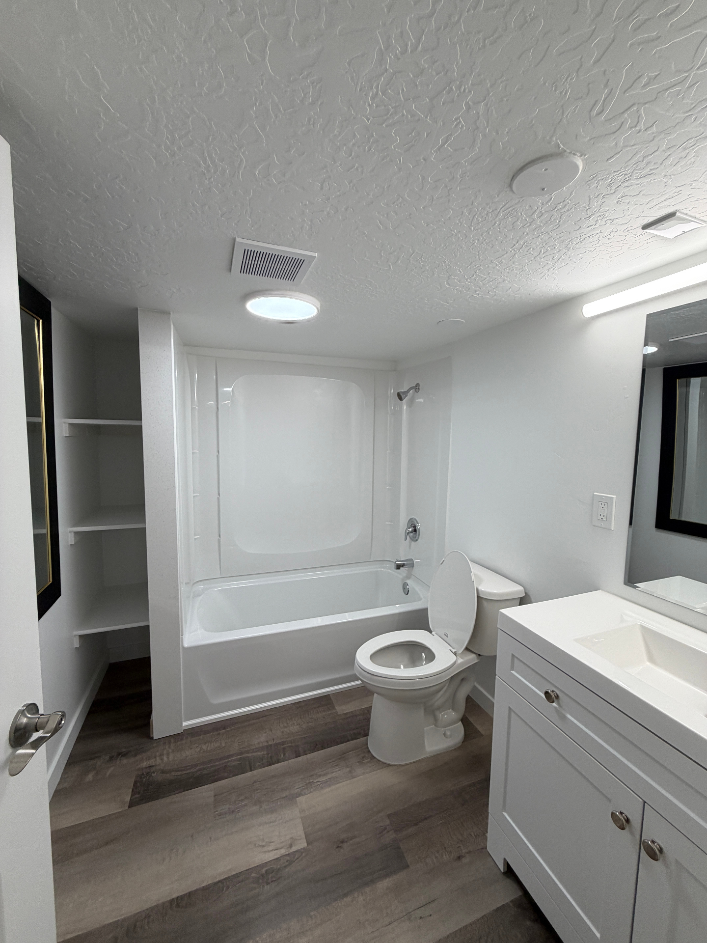 Full bathroom with tub